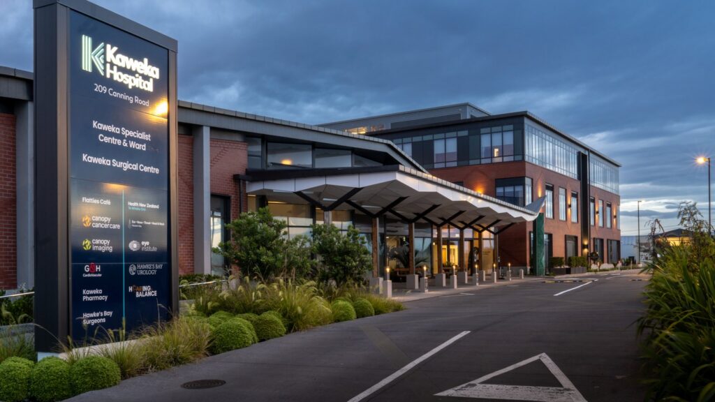 Kaweka Hospital entrance and signage at twilight, Hastings