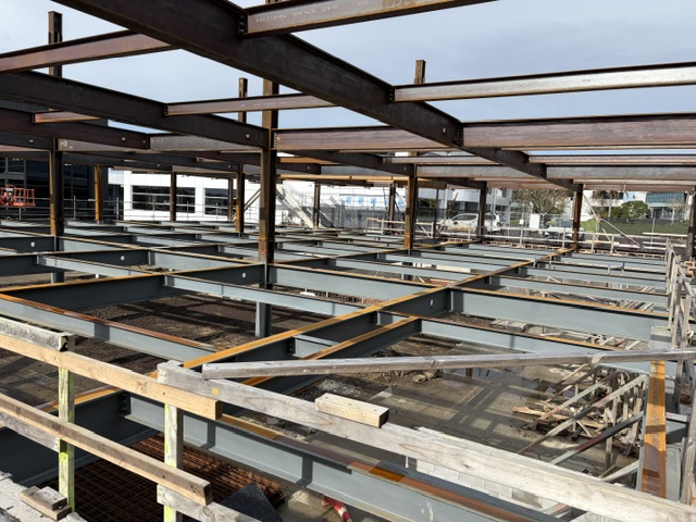 Steel floor beams framed out across the upper level